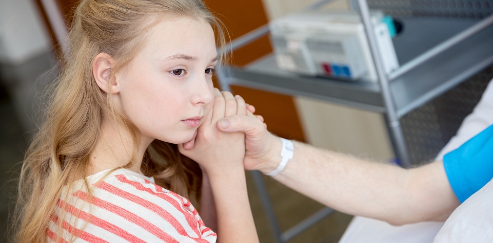 Child receiving dental treatment