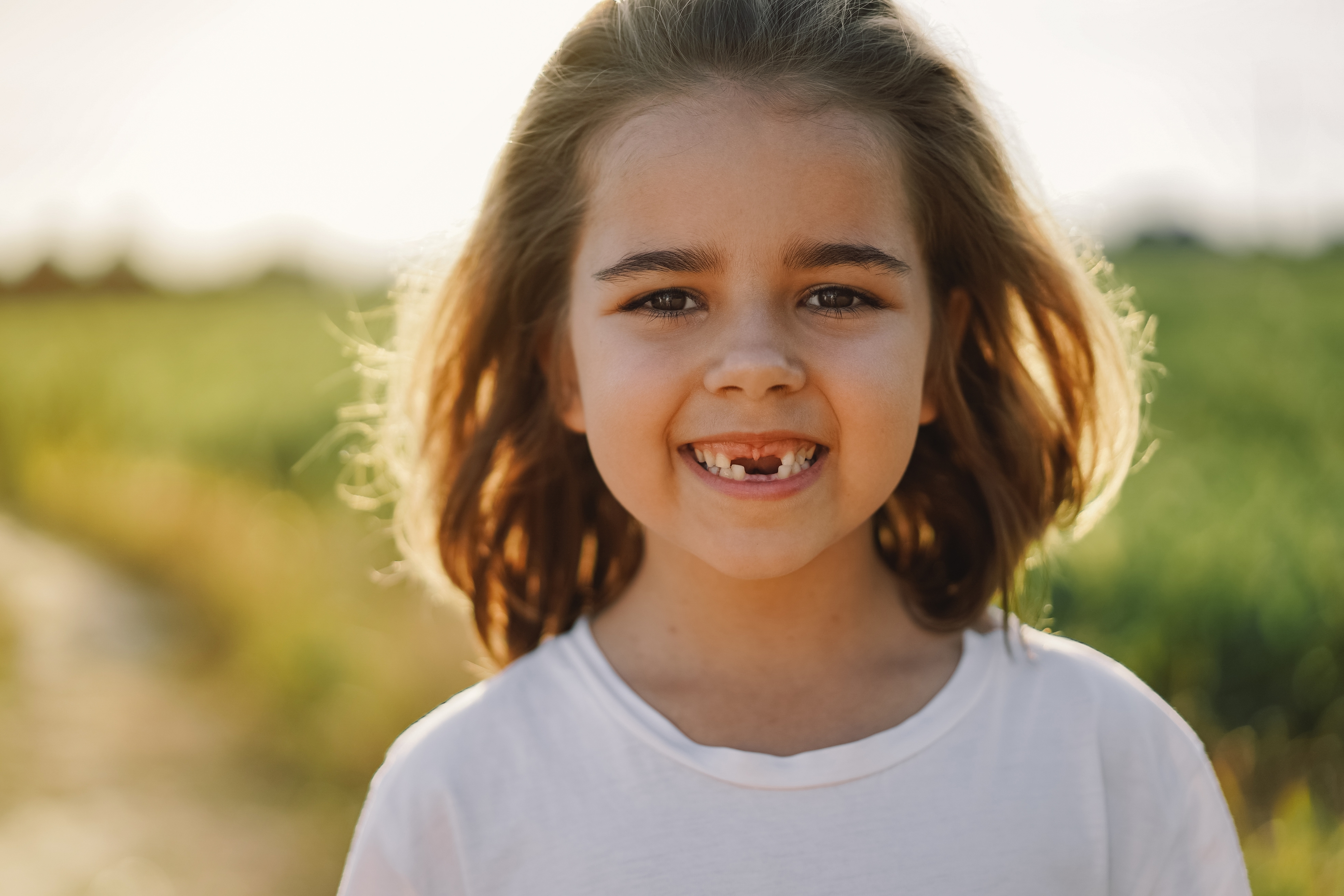 A child being treated for a chipped tooth