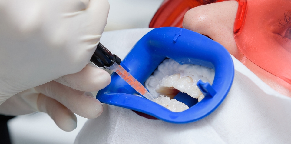Dentist examining a child's teeth