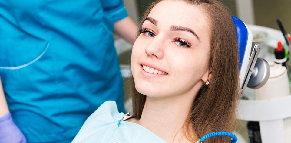 Parent and teen reviewing whitening costs
